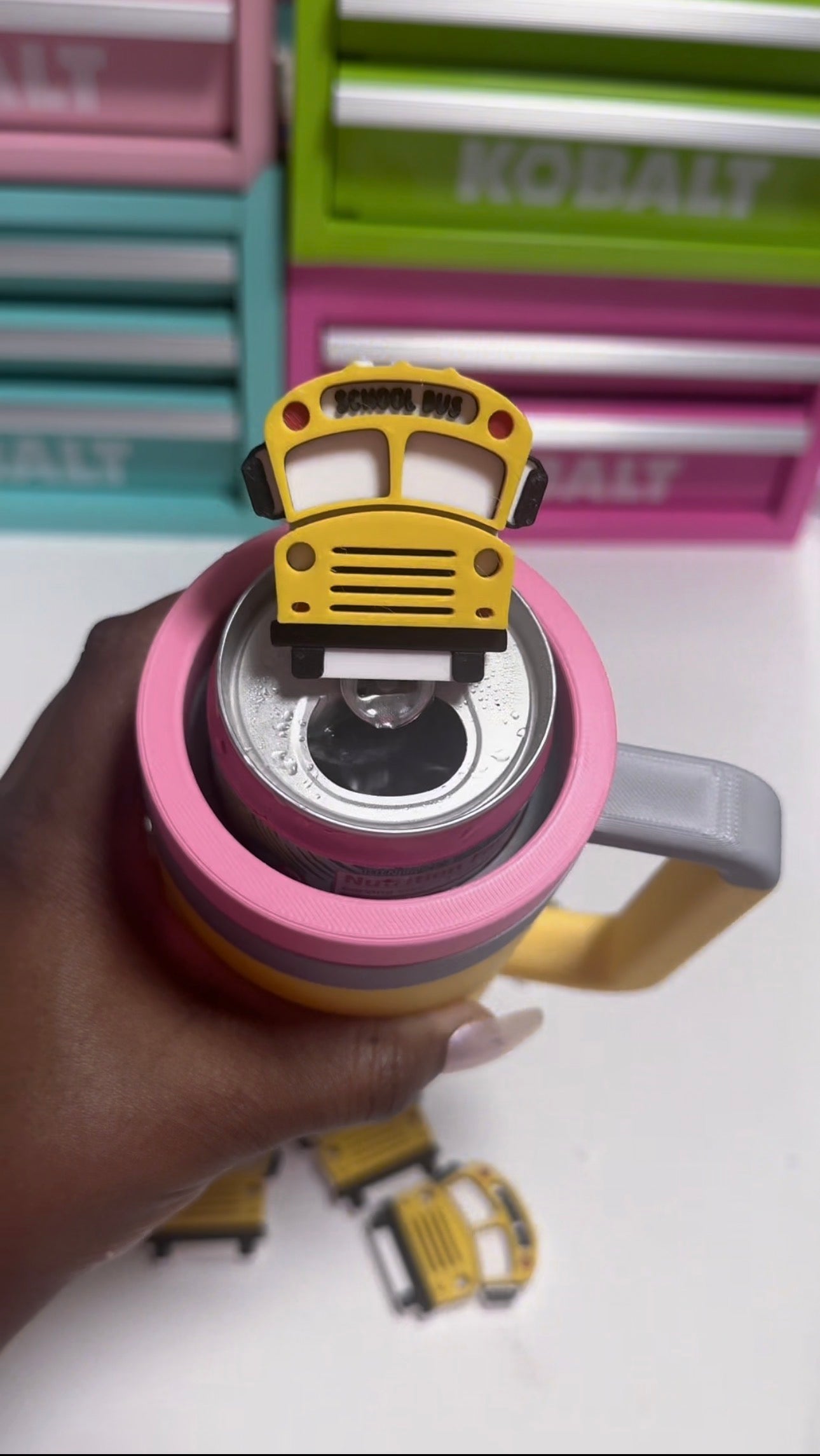 Bus soda can opener